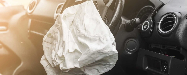 Deflated airbag in a car