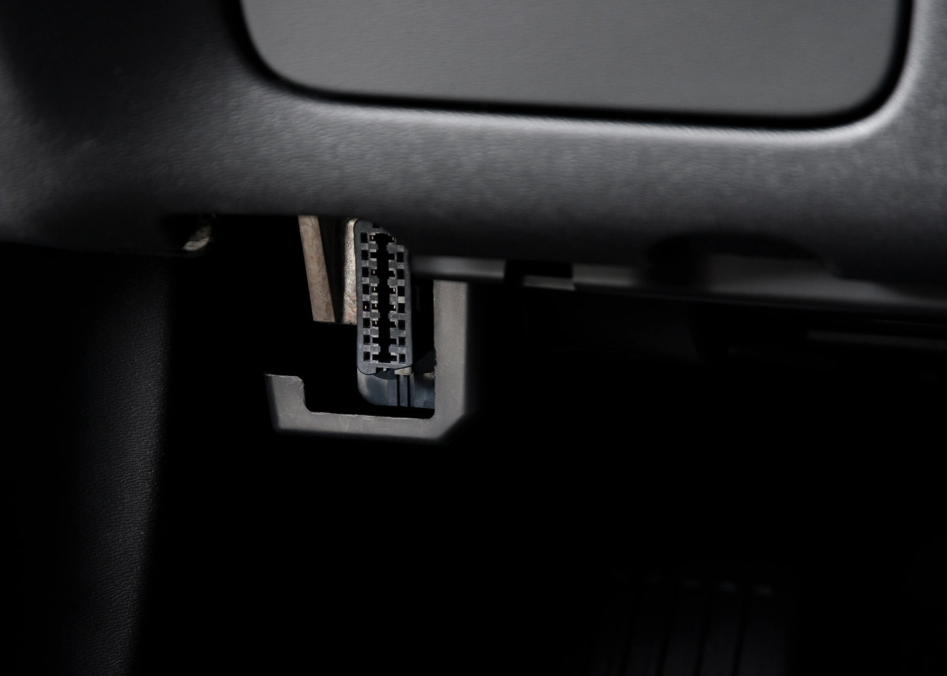 OBD port inside of a vehicle.