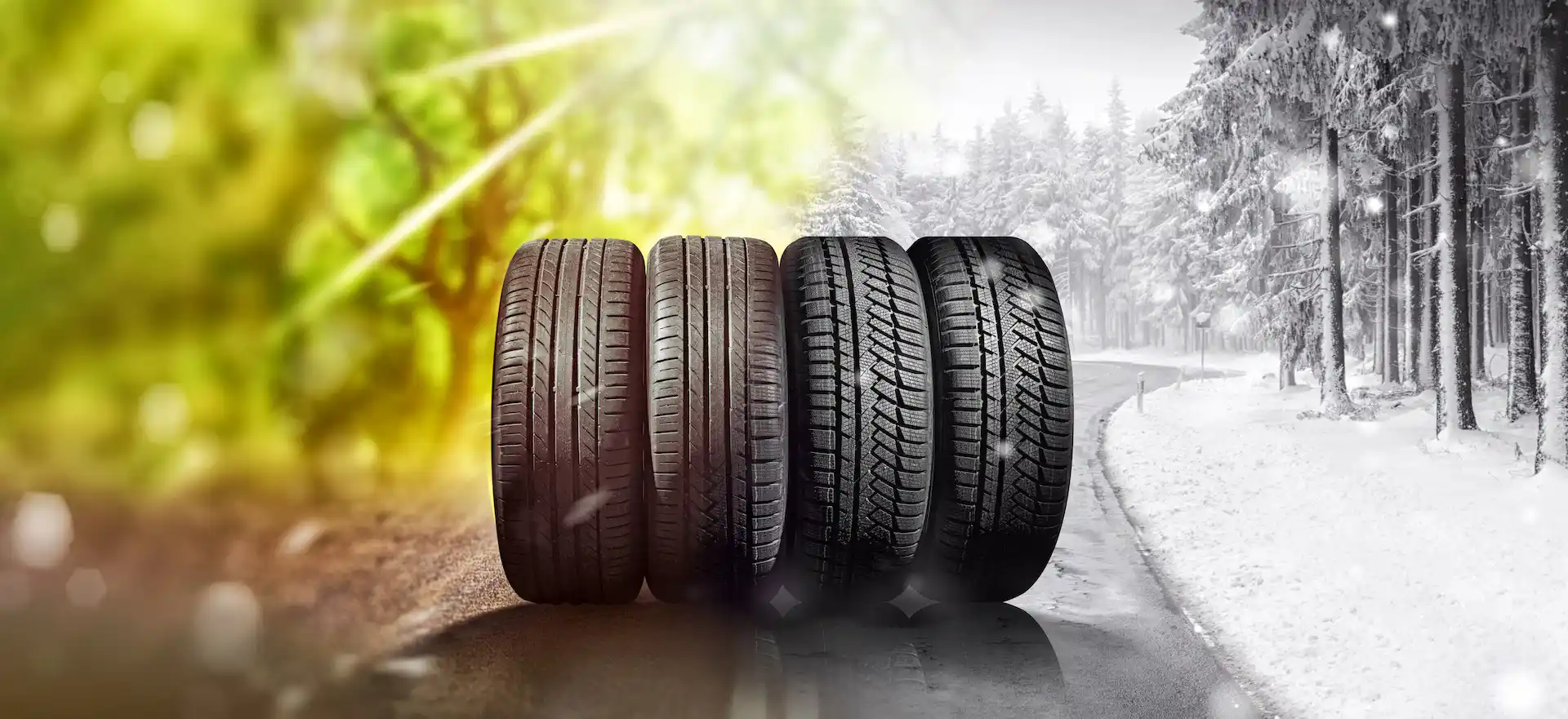 Summer and winter tyres are lined up on a road with cold weather on one side and warm weather on the other.
