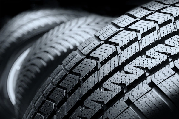 A close-up of the tread patterns on a tyre.